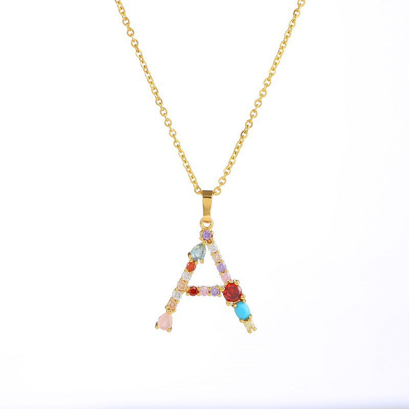 Collier avec lettres en pierres précieuses