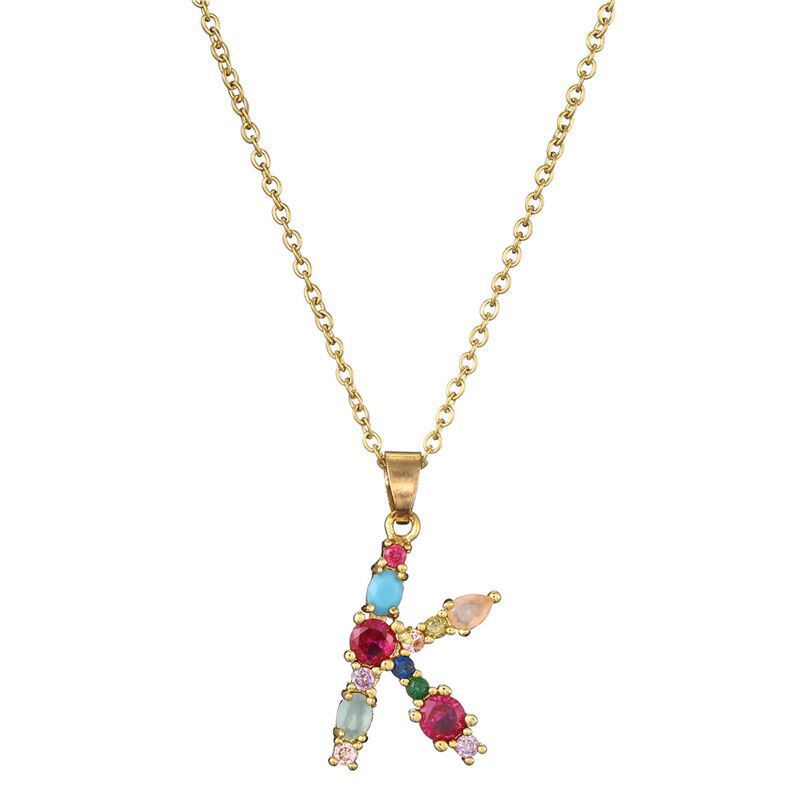 Collier avec lettres en pierres précieuses
