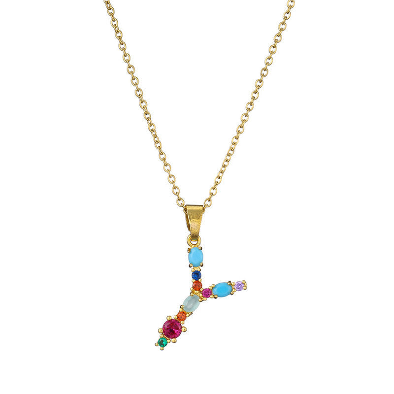 Collier avec lettres en pierres précieuses