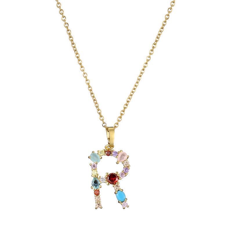 Collier avec lettres en pierres précieuses
